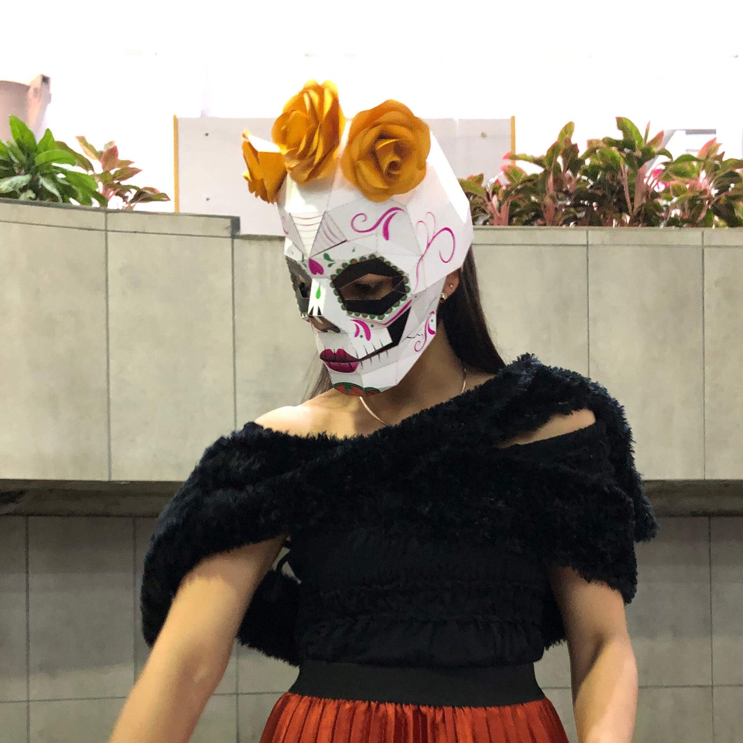Sugar Skull paper mask outdoors